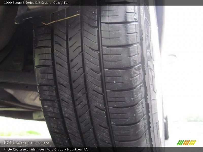 Gold / Tan 1999 Saturn S Series SL2 Sedan