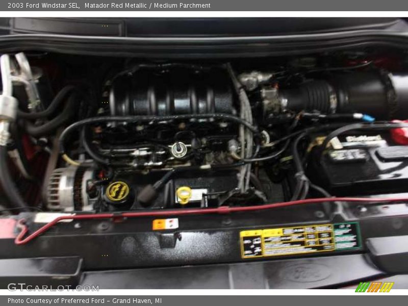 Matador Red Metallic / Medium Parchment 2003 Ford Windstar SEL