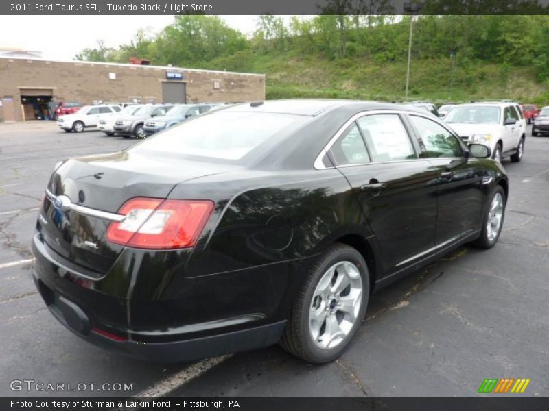 Tuxedo Black / Light Stone 2011 Ford Taurus SEL