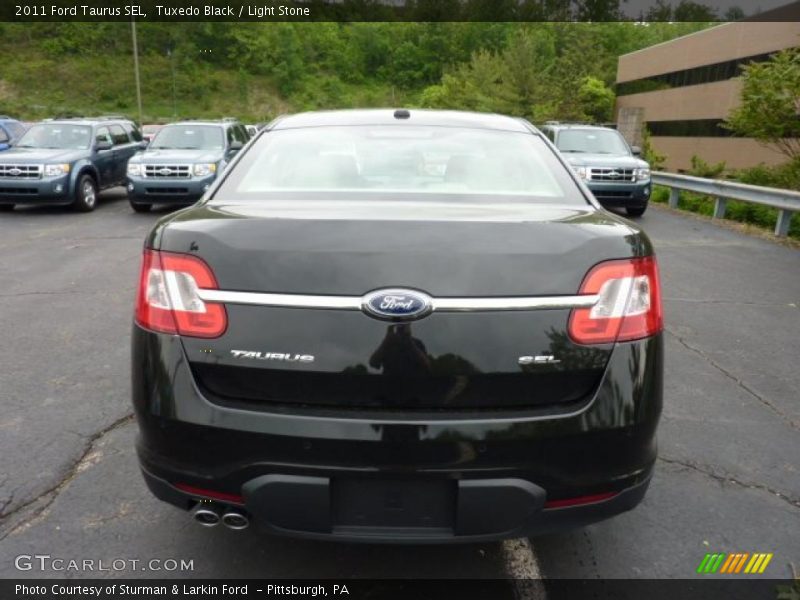 Tuxedo Black / Light Stone 2011 Ford Taurus SEL