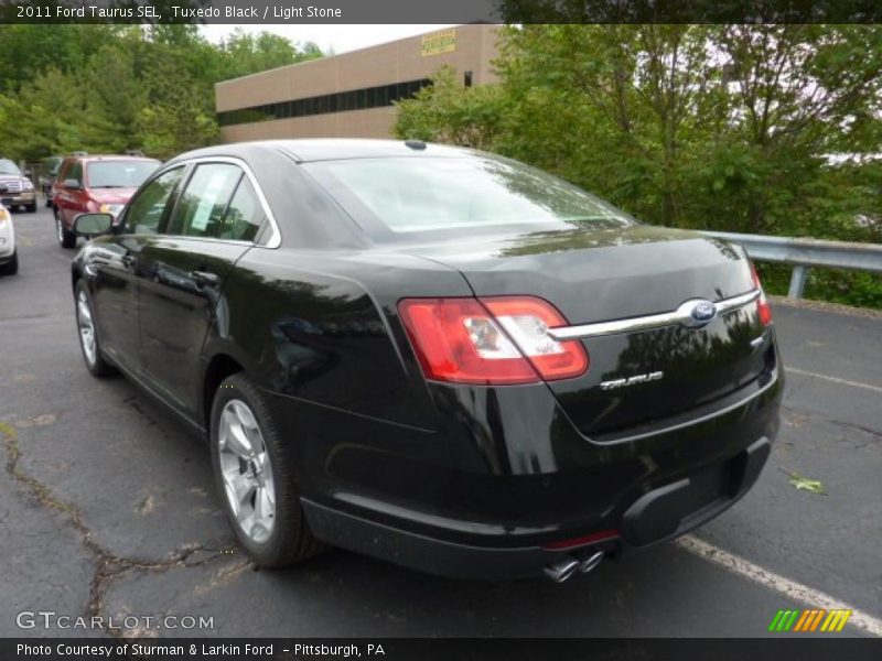 Tuxedo Black / Light Stone 2011 Ford Taurus SEL