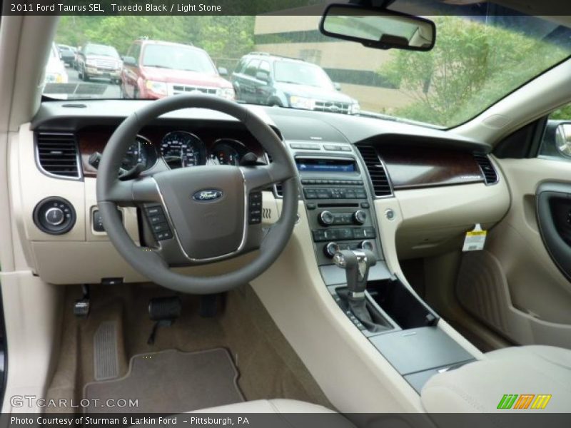 Tuxedo Black / Light Stone 2011 Ford Taurus SEL