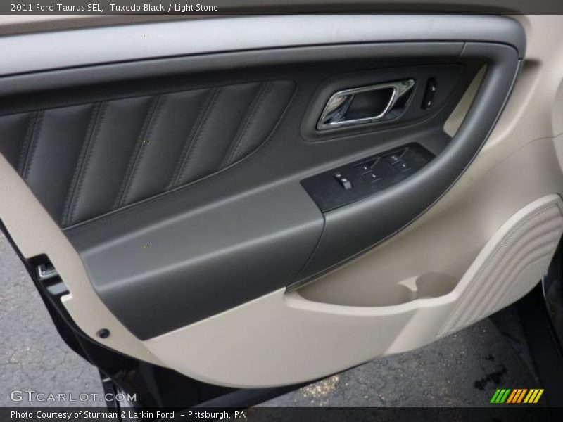 Tuxedo Black / Light Stone 2011 Ford Taurus SEL