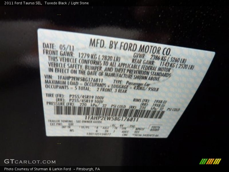 Tuxedo Black / Light Stone 2011 Ford Taurus SEL