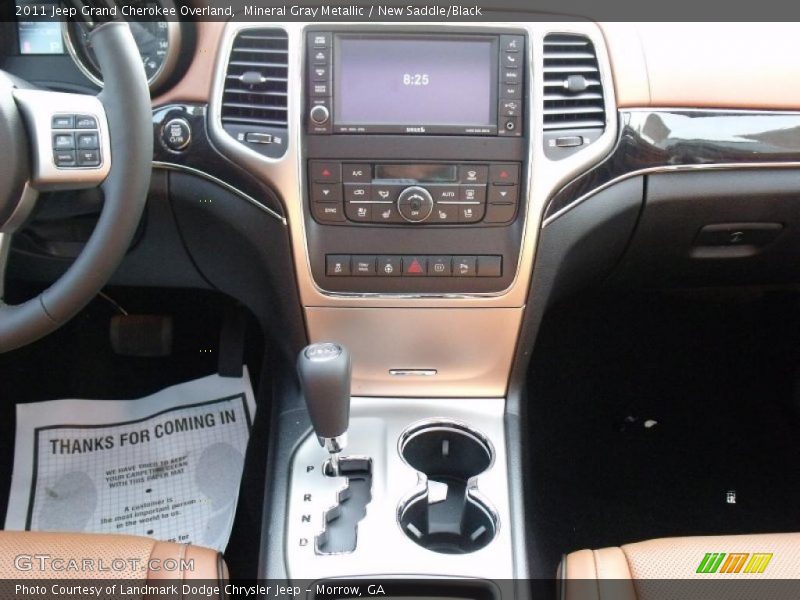 Mineral Gray Metallic / New Saddle/Black 2011 Jeep Grand Cherokee Overland