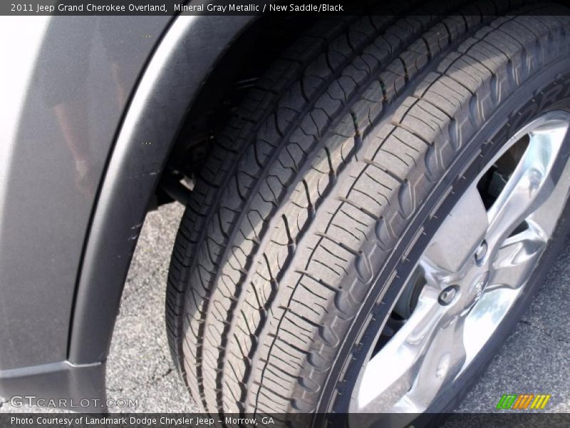 Mineral Gray Metallic / New Saddle/Black 2011 Jeep Grand Cherokee Overland