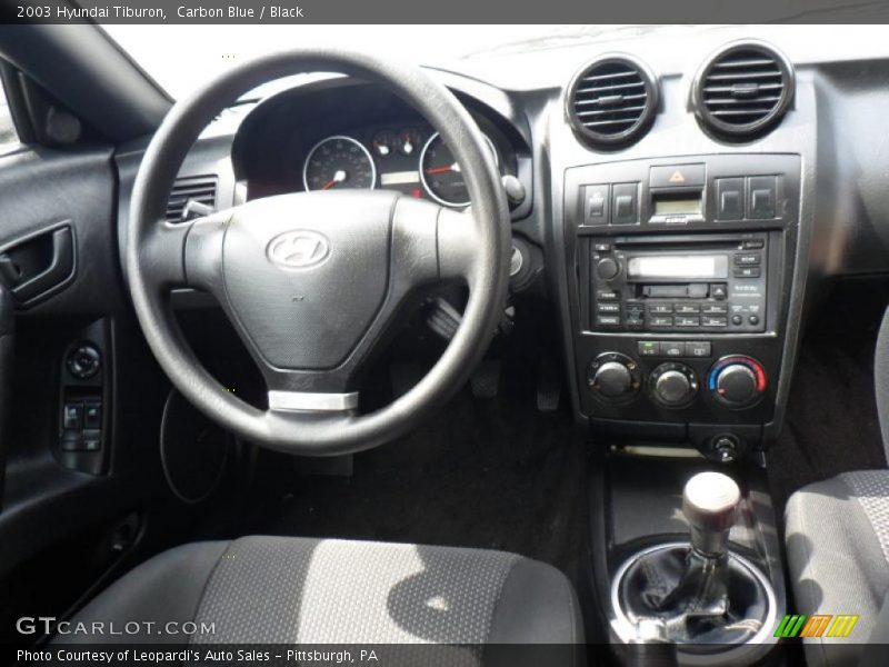 Dashboard of 2003 Tiburon 