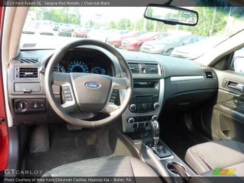 Sangria Red Metallic / Charcoal Black 2010 Ford Fusion SE