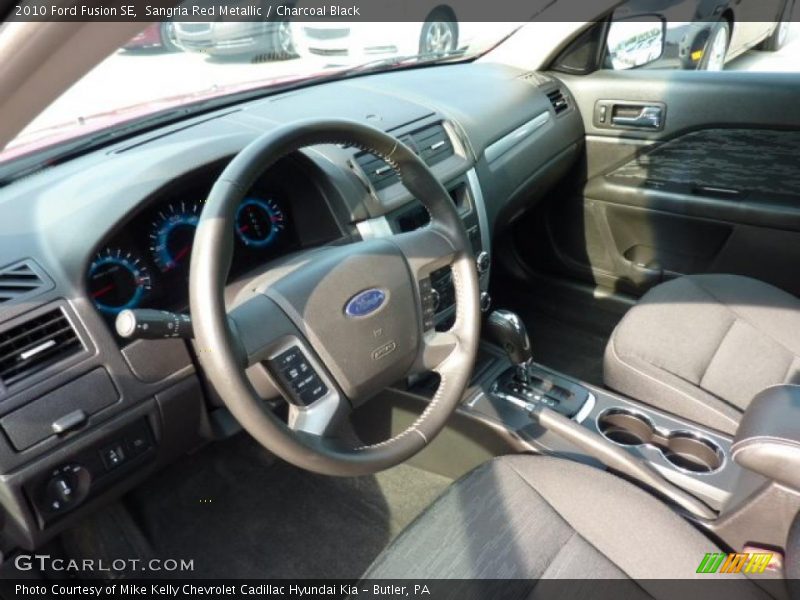 Sangria Red Metallic / Charcoal Black 2010 Ford Fusion SE