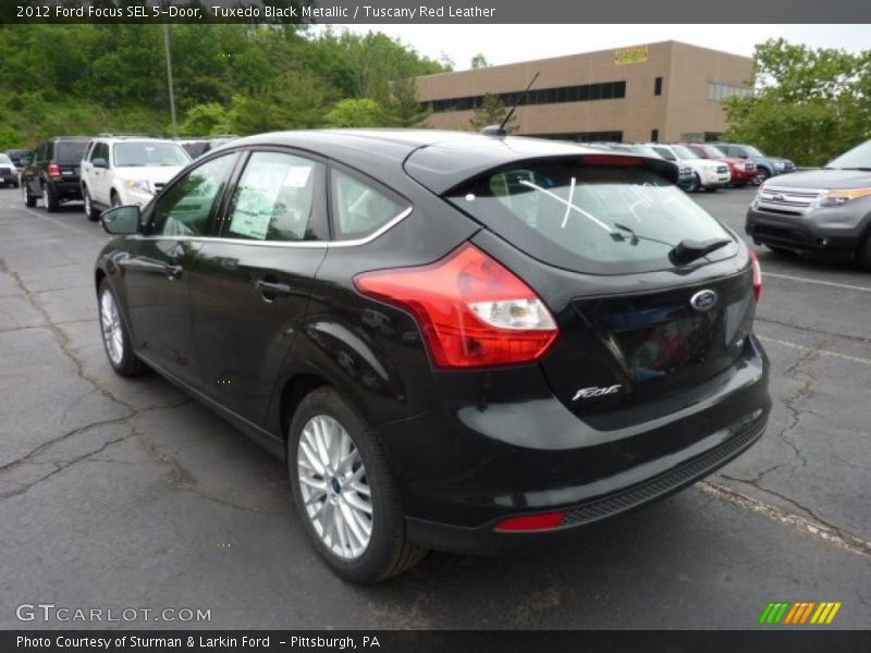 Tuxedo Black Metallic / Tuscany Red Leather 2012 Ford Focus SEL 5-Door