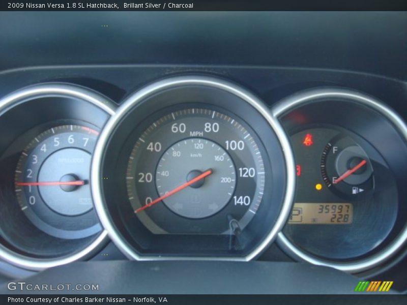 Brillant Silver / Charcoal 2009 Nissan Versa 1.8 SL Hatchback