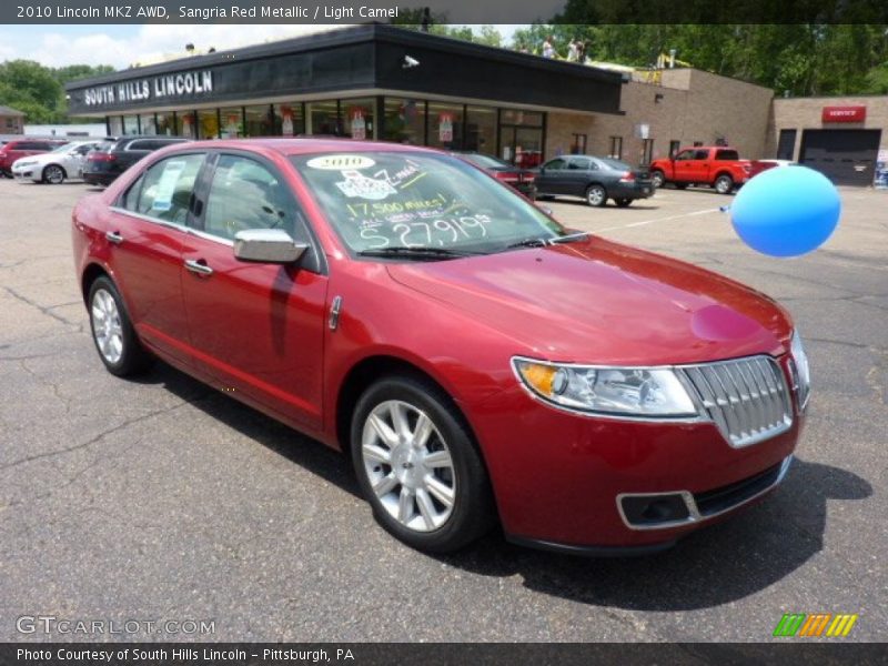 Sangria Red Metallic / Light Camel 2010 Lincoln MKZ AWD