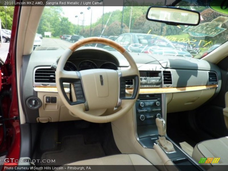 Sangria Red Metallic / Light Camel 2010 Lincoln MKZ AWD