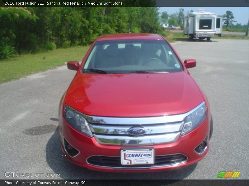 Sangria Red Metallic / Medium Light Stone 2010 Ford Fusion SEL