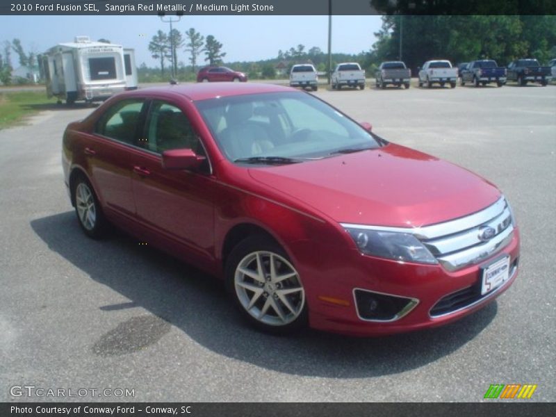 Sangria Red Metallic / Medium Light Stone 2010 Ford Fusion SEL