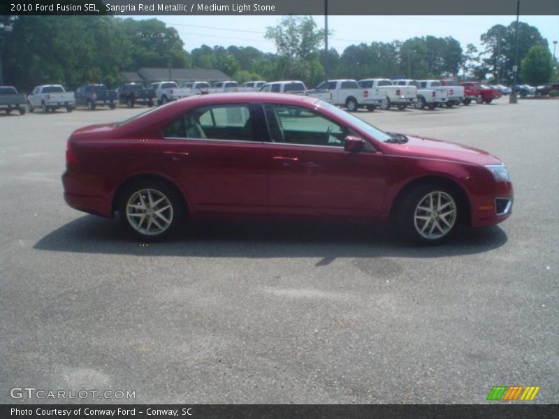 Sangria Red Metallic / Medium Light Stone 2010 Ford Fusion SEL