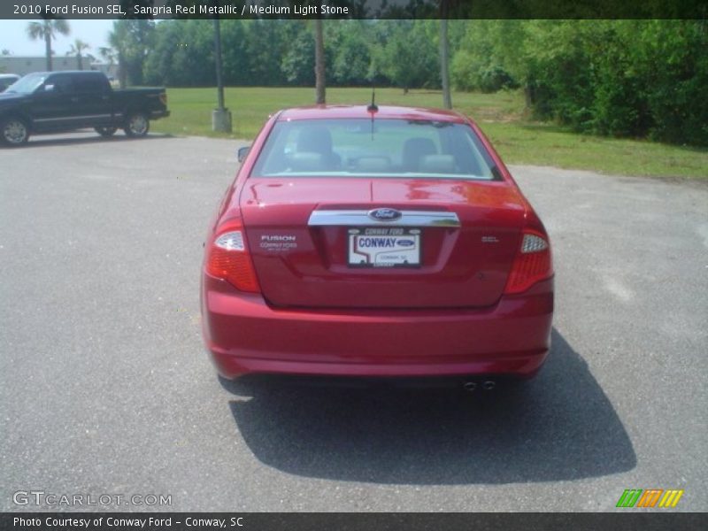 Sangria Red Metallic / Medium Light Stone 2010 Ford Fusion SEL