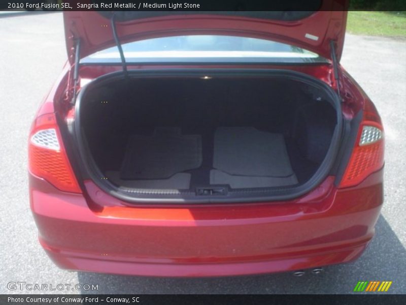 Sangria Red Metallic / Medium Light Stone 2010 Ford Fusion SEL
