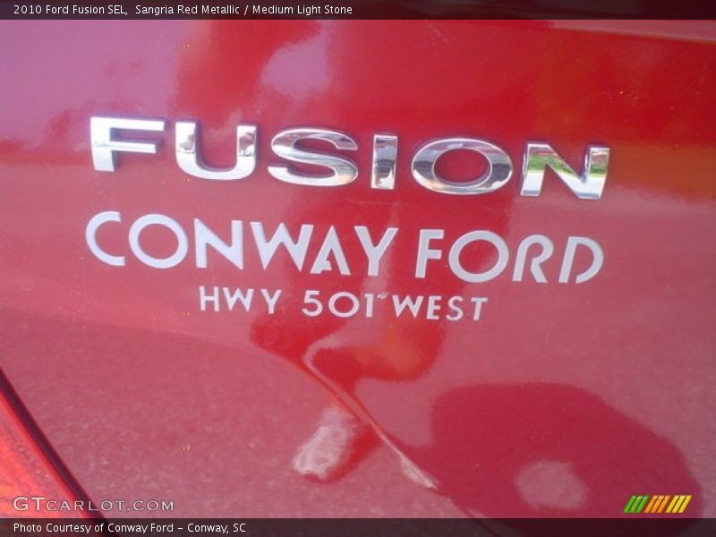 Sangria Red Metallic / Medium Light Stone 2010 Ford Fusion SEL