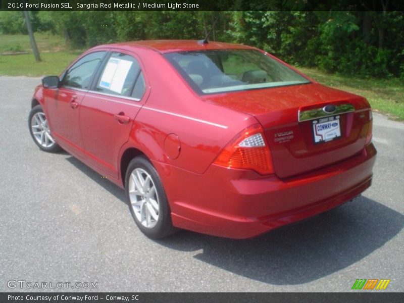 Sangria Red Metallic / Medium Light Stone 2010 Ford Fusion SEL