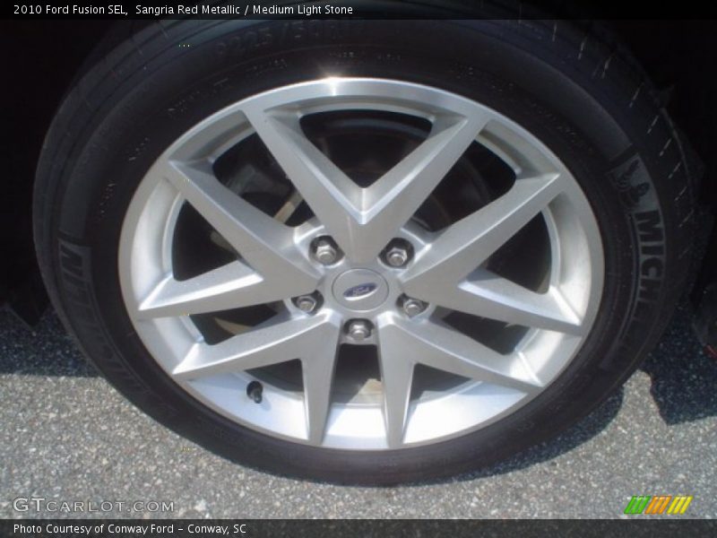 Sangria Red Metallic / Medium Light Stone 2010 Ford Fusion SEL
