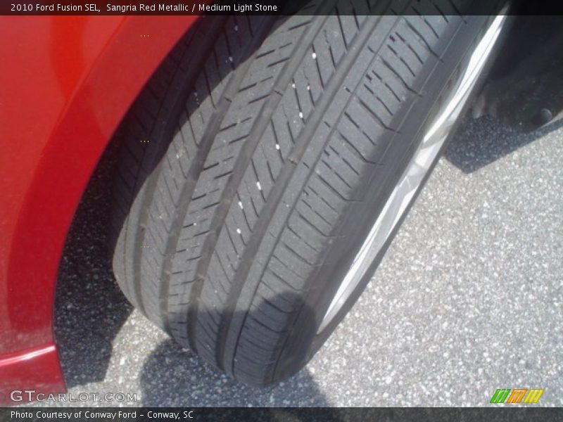 Sangria Red Metallic / Medium Light Stone 2010 Ford Fusion SEL