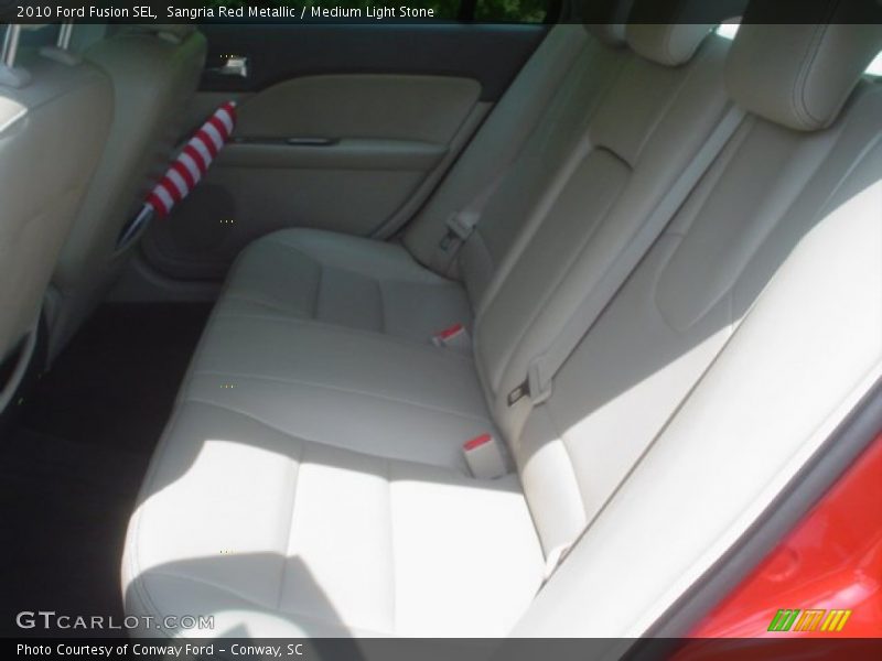 Sangria Red Metallic / Medium Light Stone 2010 Ford Fusion SEL