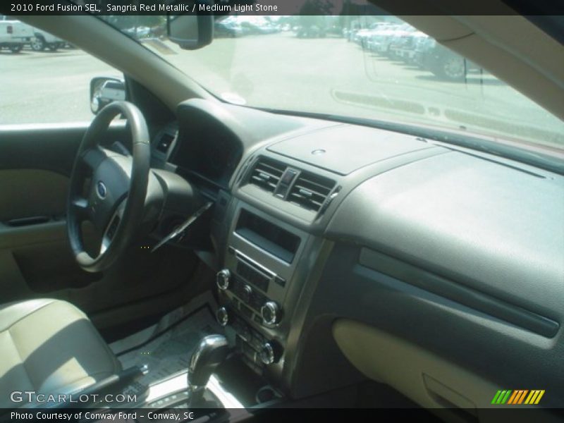 Sangria Red Metallic / Medium Light Stone 2010 Ford Fusion SEL