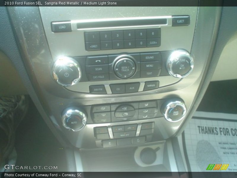 Sangria Red Metallic / Medium Light Stone 2010 Ford Fusion SEL
