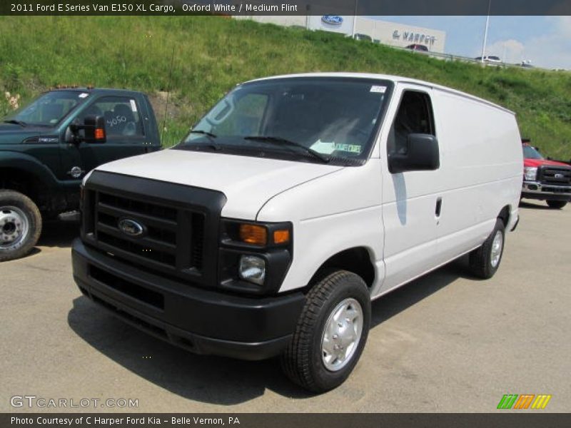 Front 3/4 View of 2011 E Series Van E150 XL Cargo