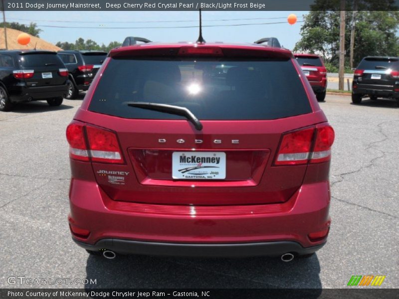 Deep Cherry Red Crystal Pearl / Black/Light Frost Beige 2011 Dodge Journey Mainstreet