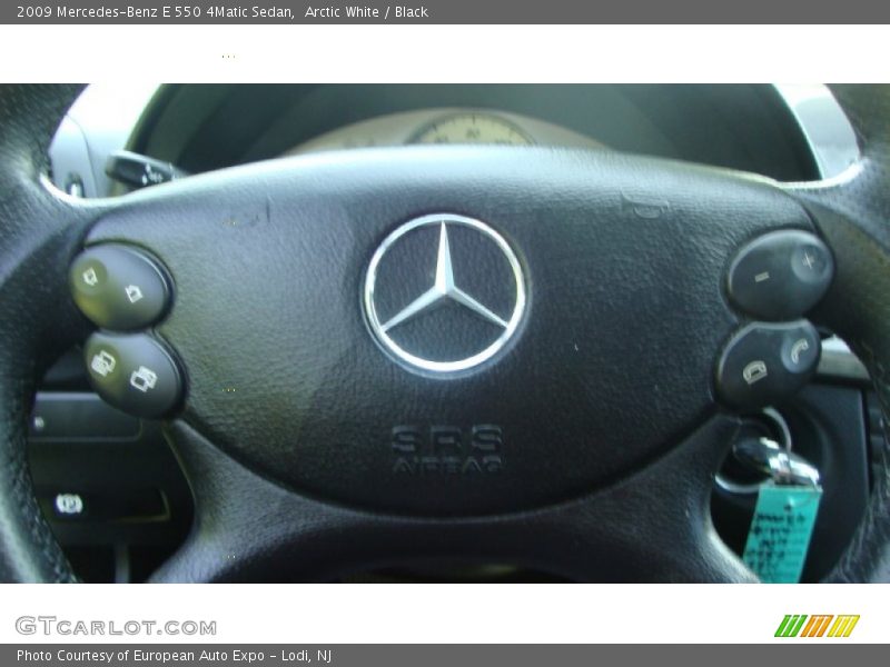 Arctic White / Black 2009 Mercedes-Benz E 550 4Matic Sedan
