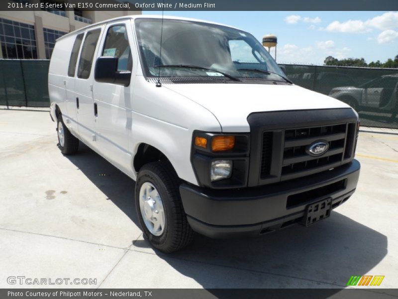 Front 3/4 View of 2011 E Series Van E150 Commercial