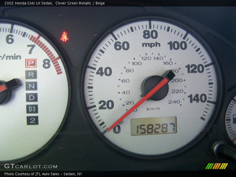 Clover Green Metallic / Beige 2002 Honda Civic LX Sedan