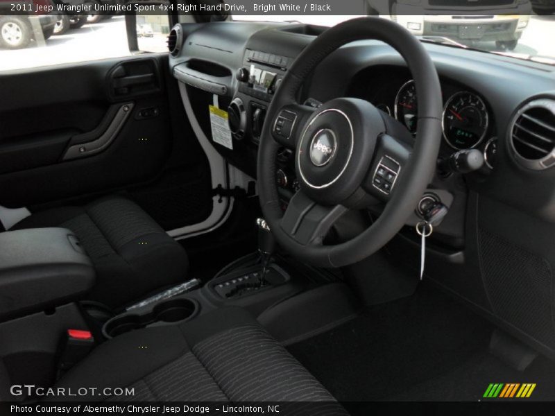 Bright White / Black 2011 Jeep Wrangler Unlimited Sport 4x4 Right Hand Drive