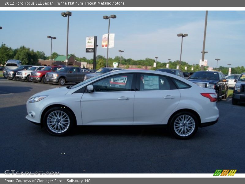 White Platinum Tricoat Metallic / Stone 2012 Ford Focus SEL Sedan