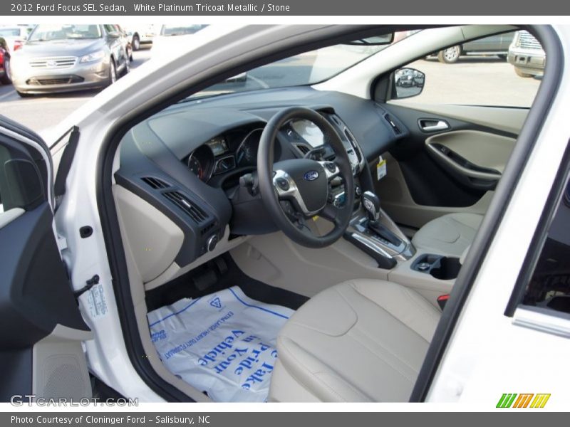 White Platinum Tricoat Metallic / Stone 2012 Ford Focus SEL Sedan