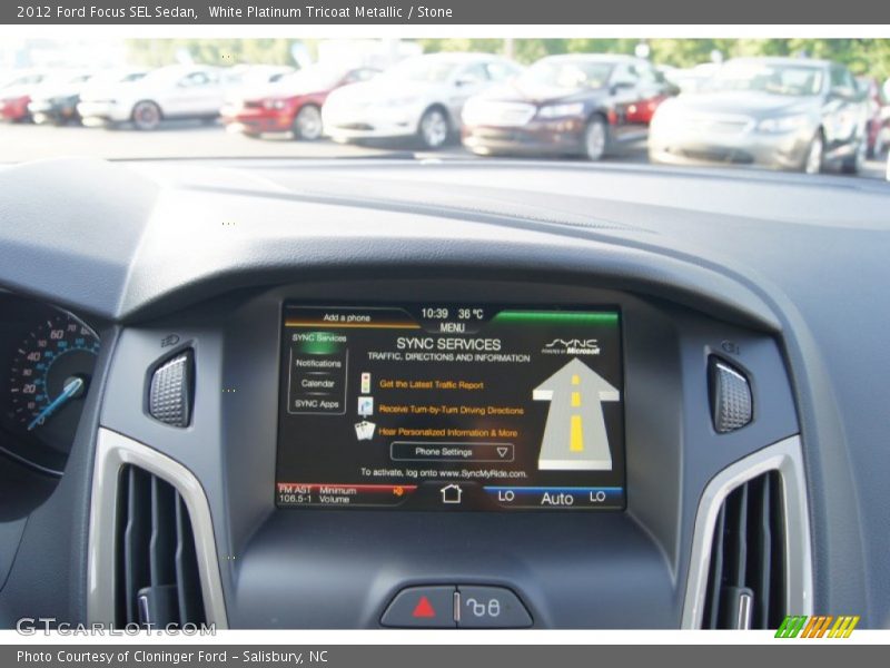 White Platinum Tricoat Metallic / Stone 2012 Ford Focus SEL Sedan