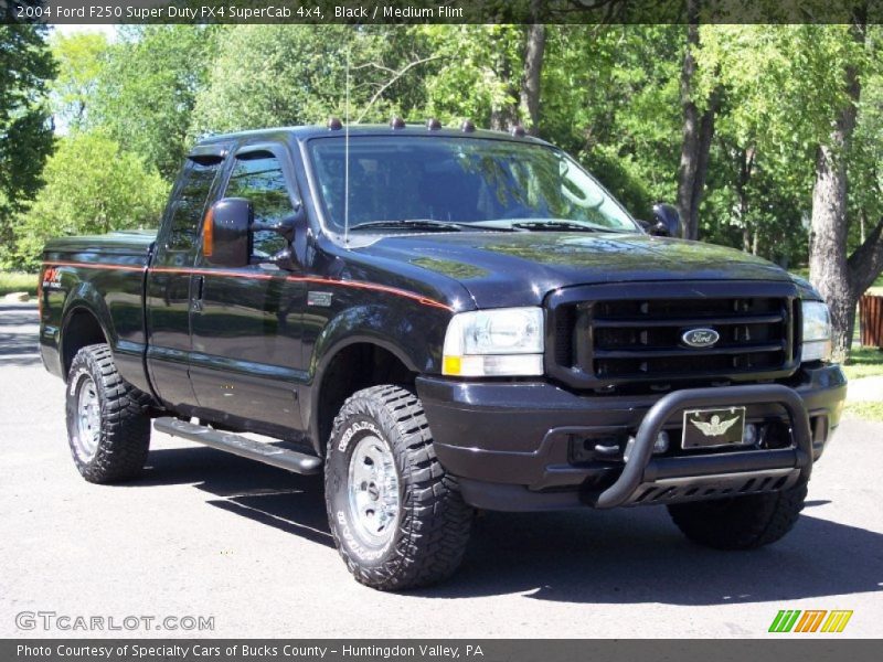 Front 3/4 View of 2004 F250 Super Duty FX4 SuperCab 4x4