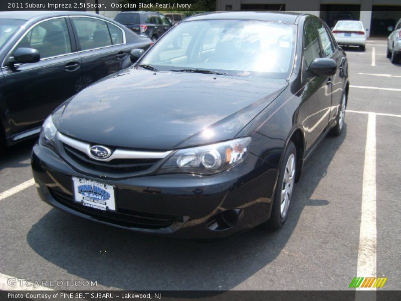 Obsidian Black Pearl / Ivory 2011 Subaru Impreza 2.5i Sedan