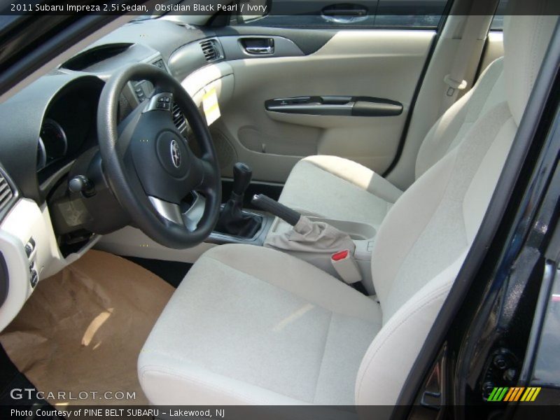 Obsidian Black Pearl / Ivory 2011 Subaru Impreza 2.5i Sedan