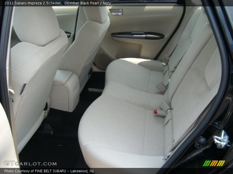 Obsidian Black Pearl / Ivory 2011 Subaru Impreza 2.5i Sedan