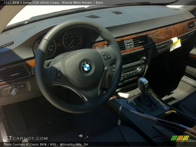 Dashboard of 2011 3 Series 328i xDrive Coupe