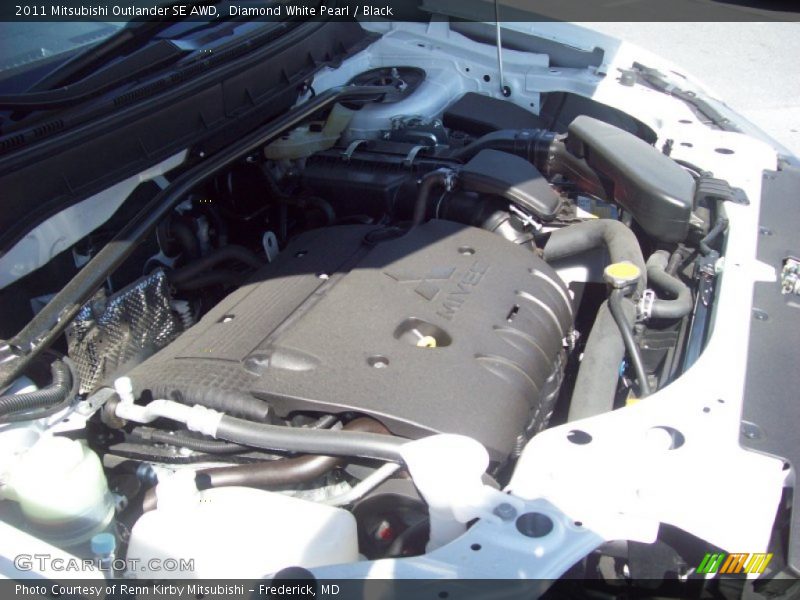 Diamond White Pearl / Black 2011 Mitsubishi Outlander SE AWD