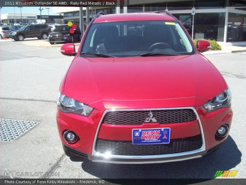 Rally Red Metallic / Black 2011 Mitsubishi Outlander SE AWD