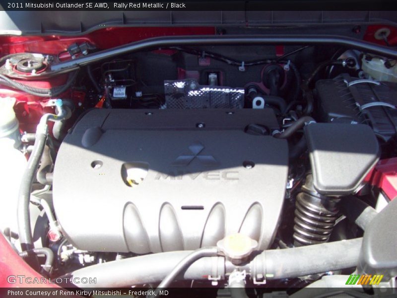 Rally Red Metallic / Black 2011 Mitsubishi Outlander SE AWD