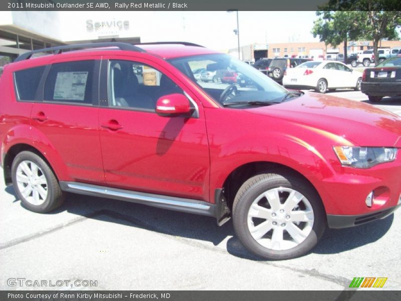 Rally Red Metallic / Black 2011 Mitsubishi Outlander SE AWD