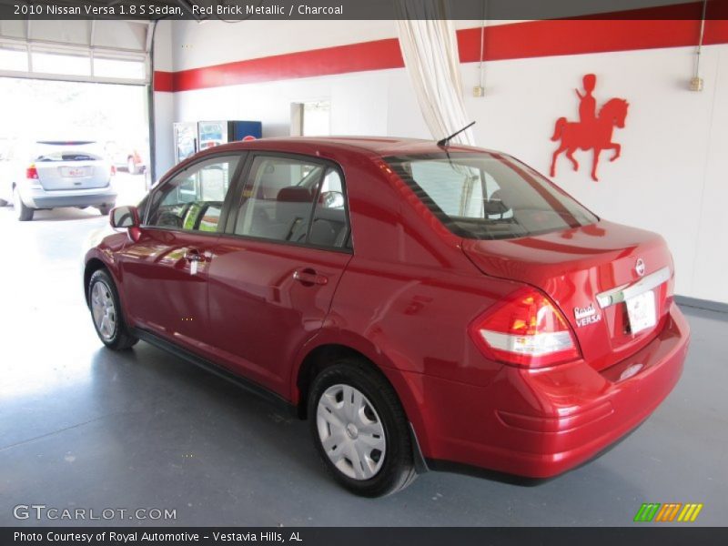 Red Brick Metallic / Charcoal 2010 Nissan Versa 1.8 S Sedan