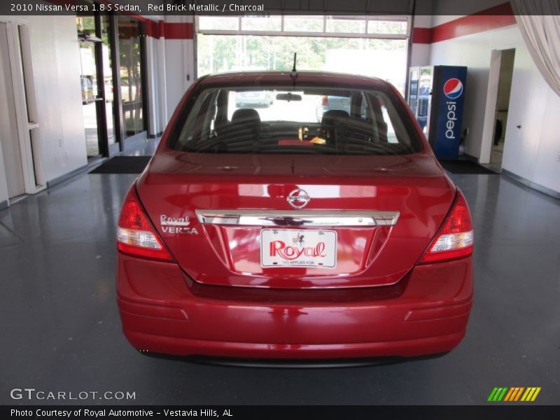 Red Brick Metallic / Charcoal 2010 Nissan Versa 1.8 S Sedan