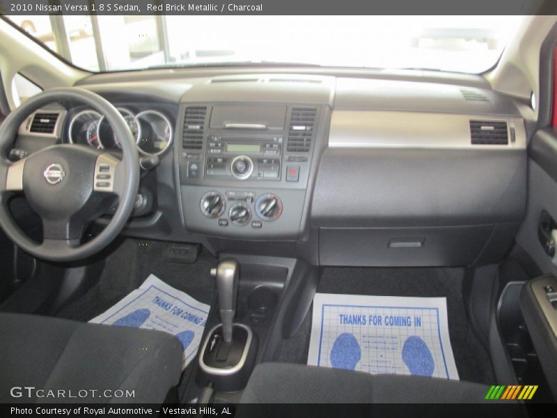 Red Brick Metallic / Charcoal 2010 Nissan Versa 1.8 S Sedan